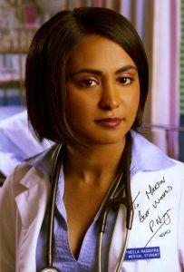 <b>NEELA RASGOTRA</b> (Parminder Nagra) - Neela